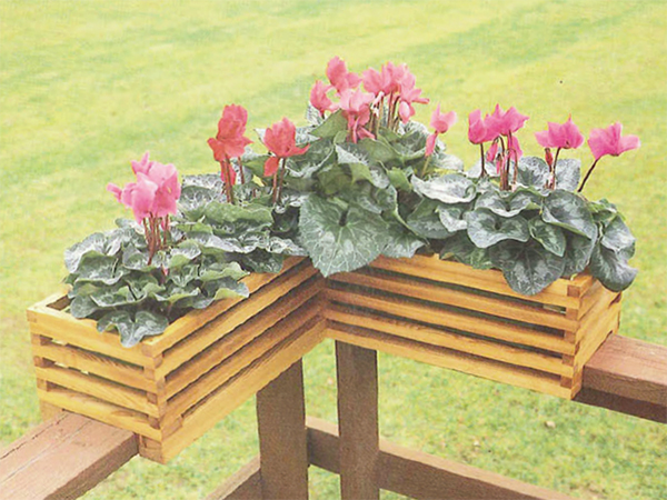 Corner deck railing planter