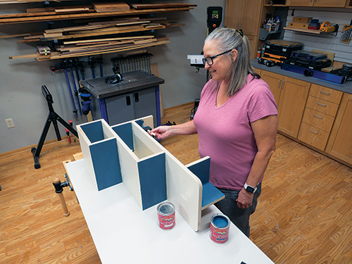 Finishing dog stairs with blue milk paint