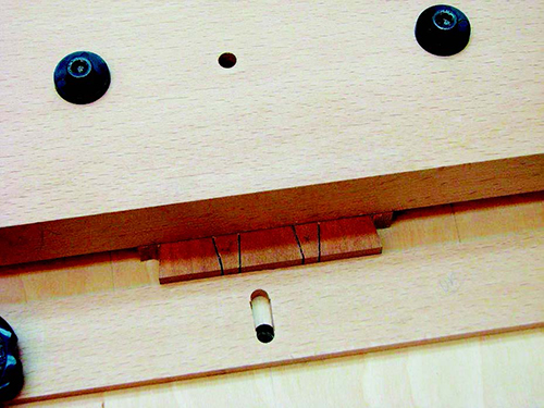 Inserting board into dovetail cutting jig