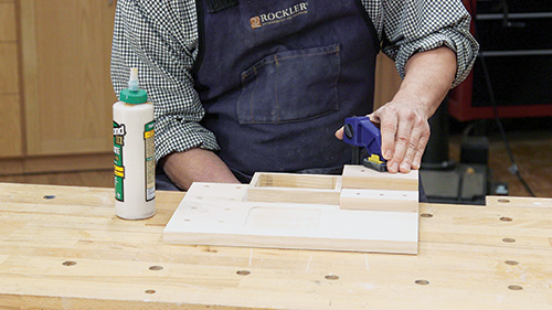 Gluing layers of drill bit organizer stack together