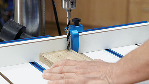 Setting up cut for drill bit container installation