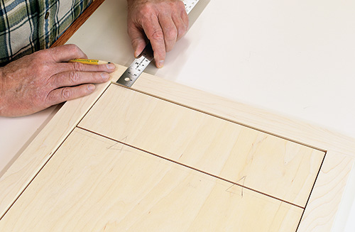 Marking drawer face on drill press cabinet panel