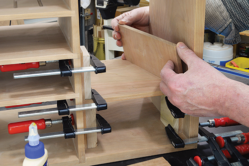 Creating the “shelf stack” is simply a matter of gluing and stacking the shelves and side pieces. Start by gluing the two bottom side pieces in place. Top with the first shelf and follow with the next set of sides.