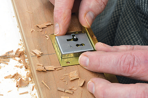 Check the depth of the initial mortise by setting the lock in place upside down.