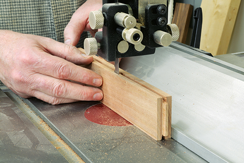 Resaw most of the back side of the center stile on the band saw, then follow up with a hand plane and/or sander.