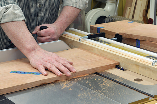 The two sides receive a 3/8”-deep x 3/4”-wide rabbet on the inside bottom edges, and a 3/8”-deep x 3/4”-wide dado 3” from the top.