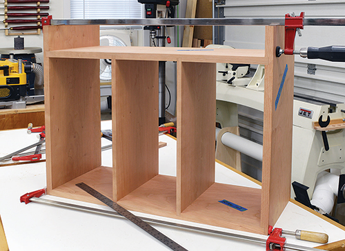 With all rabbets and dadoes cut, do a dry assembly of the carcass to check all the case joinery.