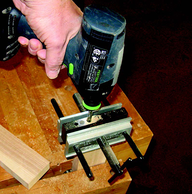 Cutting holes for installing dowels on bench base
