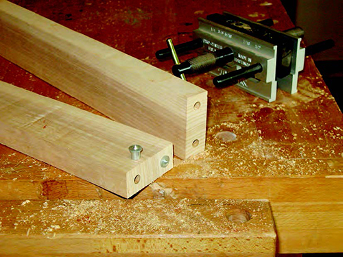 Installing metal dowels for bench base joinery