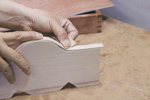 Sanding down bent wood tray handles