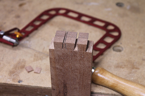 In-progress dovetail pin cuts