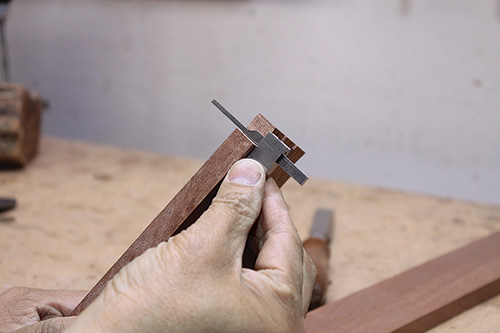 Checking depth of dovetail pins to ensure tight fit