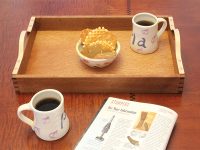 Serving tray with curved handles