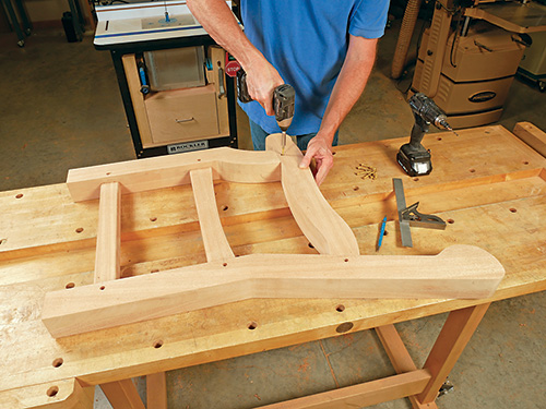 Driving screws into garden bench side assembly