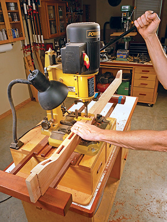 Cutting mortises in garden bench back rail with mortising machine