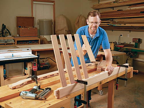 Dry fitting garden bench back slats to test strength of assembly