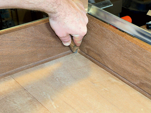 Clamping envelope table pieces together