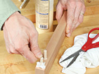 Using fabric to fill gap between dowel and wood