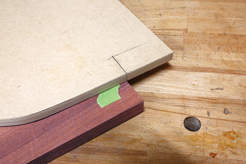 Taping shelving template to purpleheart trim blank