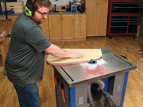 Using template to form shelf shape with router