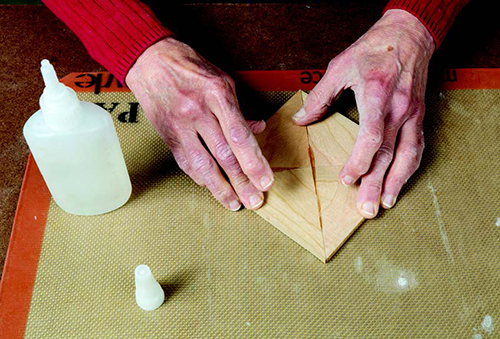 Exchange the halves of the two pieces, then re-glue for two new squares. When cut into a circle, all edges will have the same grain.