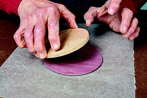 To center the lid, accurately position the liner on the underside. Establish and mark the correct position on both pieces, then glue and clamp until fully set.