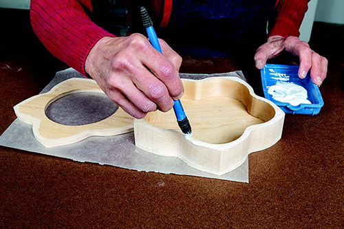 Because of the small top opening, the interior surfaces are sealed and sanded before the top is glued into place. A small silicone brush helps apply the correct amount of glue for attaching the top.