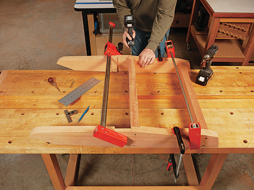 Clamping adirondack chair seat stretchers