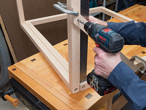 Attaching supports between segments of folding bike rack