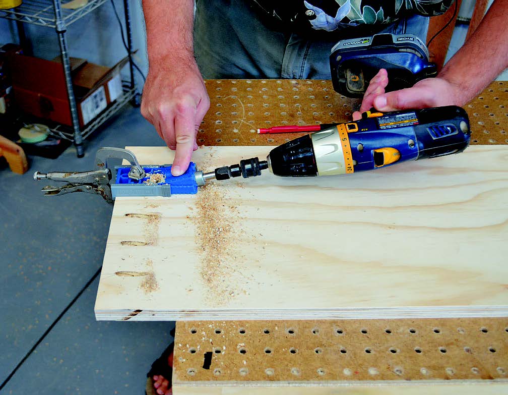 Drilling screw holes for attaching cabinet bottom