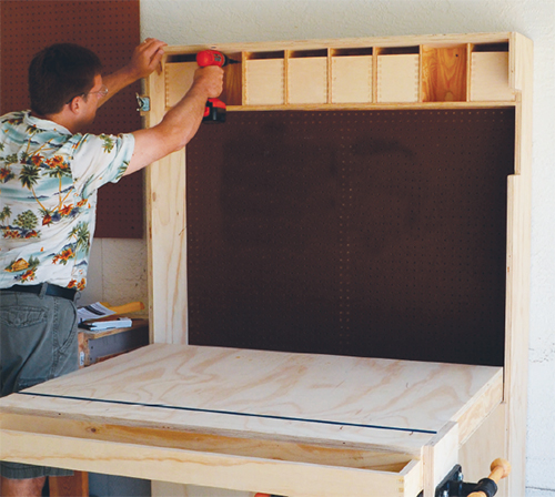 Placing folding workstation against garage wall