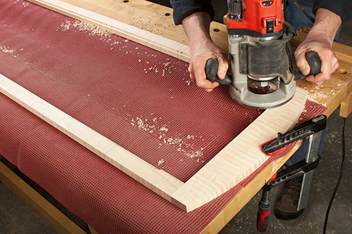 Cutting interior portion of mirror mounting frame