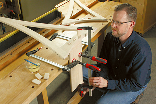Clamping up mirror base assembly with stretchers