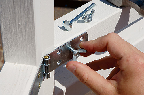 Bolting and securing portable gazebo walls together and attaching them with nuts