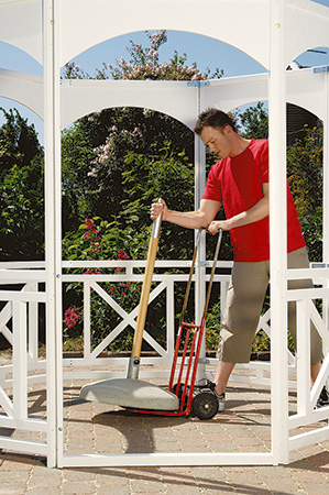 Adjusting the umbrella base of a portable gazebo