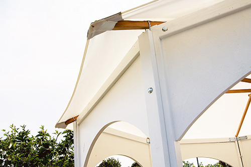 Overhang on umbrella over gazebo panels