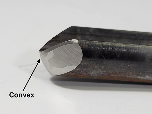 A woodturning gouge with a convex blade