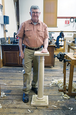 Ernie Conover displays a turned Doric column