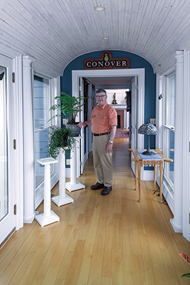 Turned greek columns used as plant stands