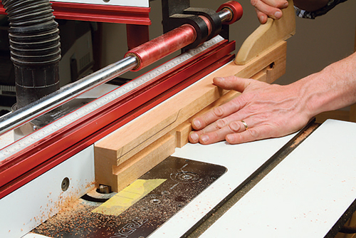 Mill the front legs’ rail mortises at the router table with a 1/2" straight bit. Mark the bit location on the table to guide these “drop” style cuts.