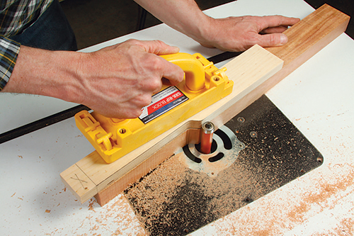 The cloudlift leg profiles are best made against a template secured with double-sided tape. Use a piloted flush-trim bit to follow the template.