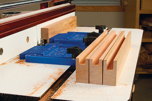 The side panels require two different groove depths in the side rail blanks (shown): 1/2” deep for the bottom rails; 3/4" deep for the top rails.