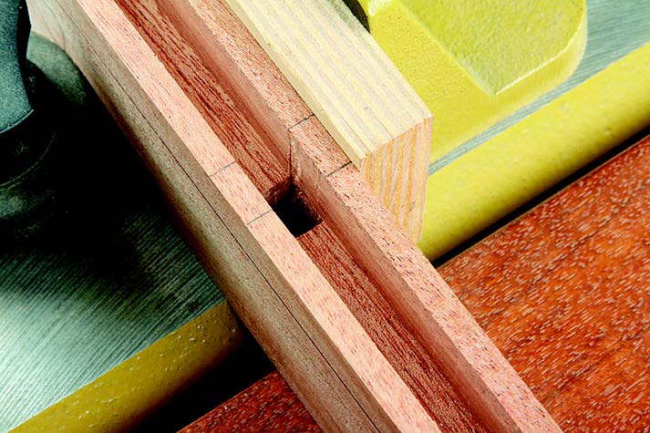 The walls of the panel grooves allow the mortiser’s chisel to simply tuck in between for alignment.