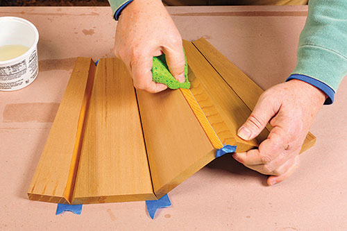 Wiping glue on edges of planter box panels