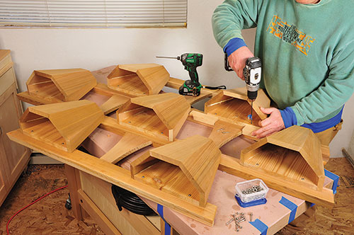 Fastening planter boxes to deck frame