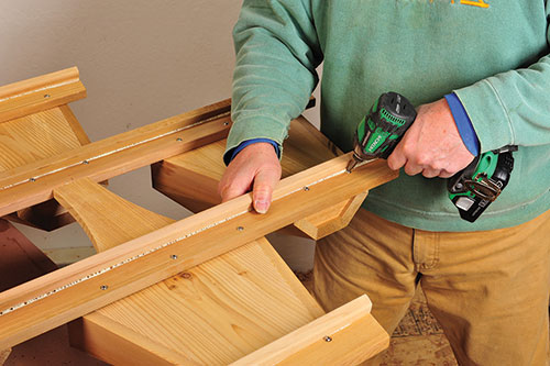 Fastening planter boxes to deck frame from back side