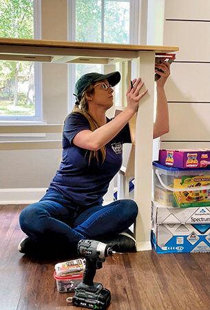 Screwing tabletop into tall table base