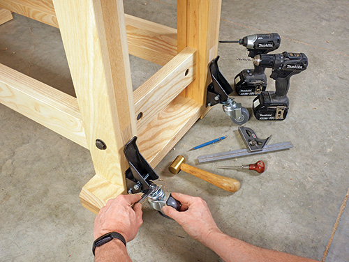 Installing casters on workbench legs