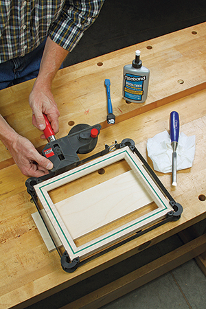 Joining frame with band clamp