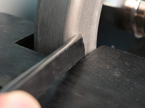 Using side of CBN wheel for sharpening